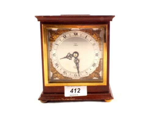 A mahogany cased Elliot mantel clock by Dent of London