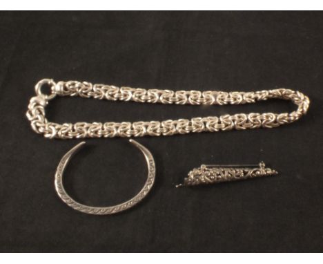 A silver bangle marked 925, a silver necklace marked 925 plus a white metal brooch