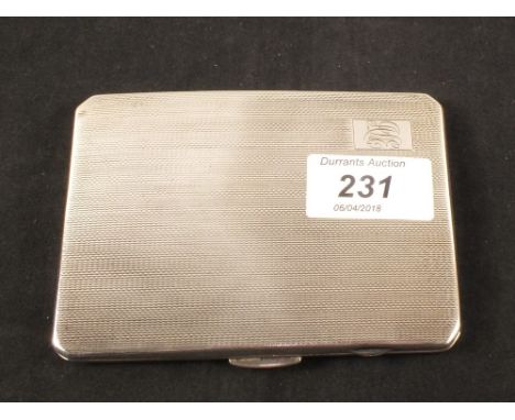 An engine turned silver cigarette case