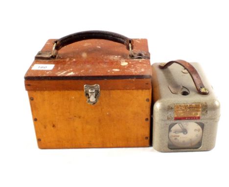 A cased pigeon clock