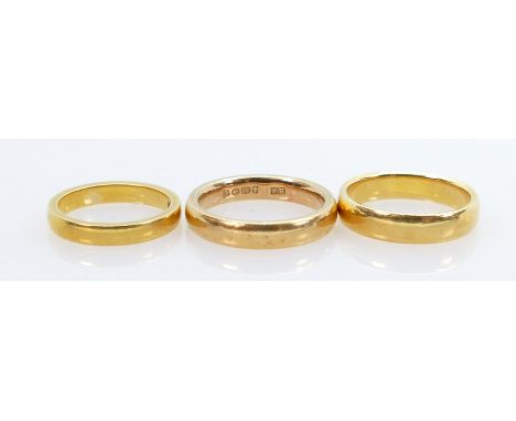 Three 22ct wedding rings sizes K L &amp; H 16.2g. (3):