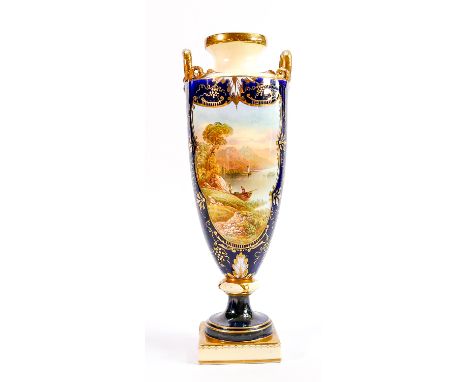 Hand decorated R J Keeling handled vase: With panelled landscape decoration, damage noted to ribbon &amp; stress crack to bas