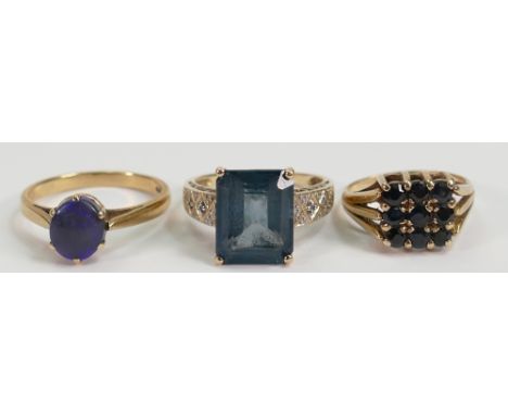 A collection of 9ct ladies dress rings: Comprising 9ct ring set with large rectangular blue stone size P, 9ct gold ring set w