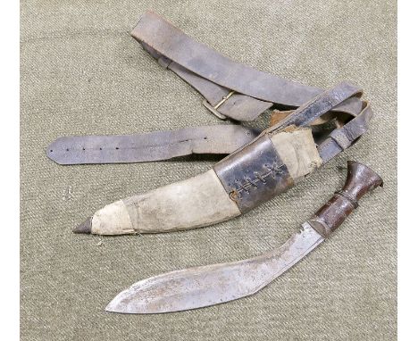 British Military Gurkha Type Kukri: In canvas on leather scabbard with matching belt, total length 43cm. 