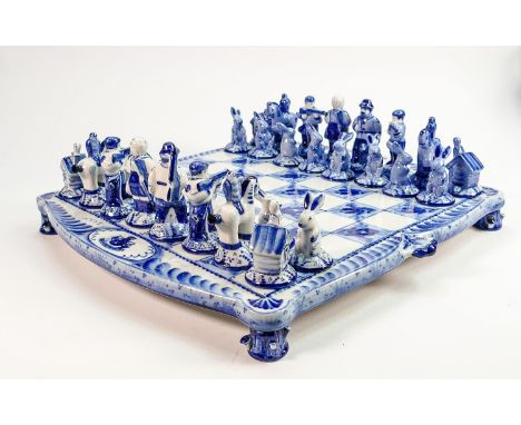 Russian blue and white ceramic chess board and pieces by Gzhel: Height of King 7.5cm with matching board.