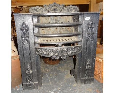 Cast iron fire grate&nbsp;with rococo style decoration
