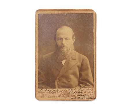 DOSTOEVSKY (FYODOR)Cabinet portrait photograph by Konstantin Shapiro, SIGNED AND INSCRIBED BY DOSTOEVSKY IN RUSSIAN to Jacob 