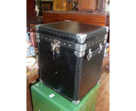 Studded black leather two handled trunk