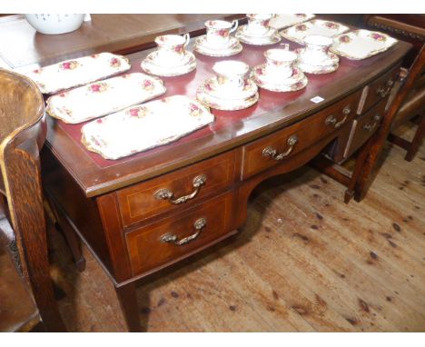 Edwardian mahogany bow front five drawer writing table