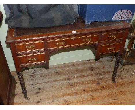 Late 19th Century mahogany five drawer writing table on ring turned legs bearing paper label for Thomas Fry & Co. Artistic Fu