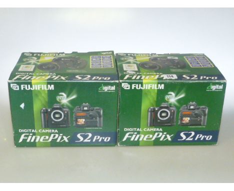 Two Fujifilm Finepix S2 Pro cameras, one with lens