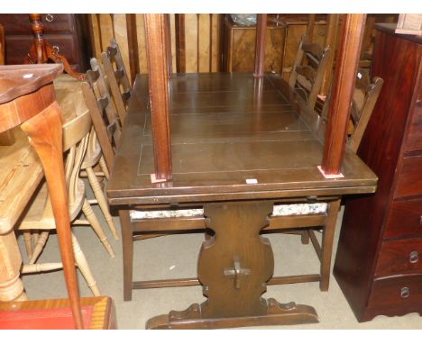 Ercol draw leaf dining table and four ladder back chairs