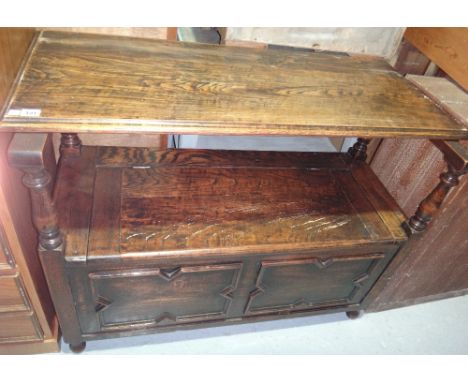A 20th century oak monk's bench.