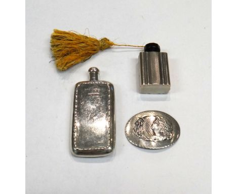 A silver scent bottle, of curved rectangular flask form, having decorated borders, Birmingham 1913, another scent bottle, the