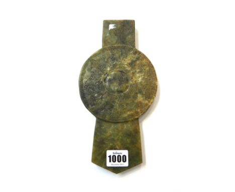 A Chinese mottled jade tablet, 20th century, carved as a combined bi disc and qui, carved to one side with winged dragons pur