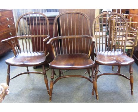 A set of six George III style stick back dining chairs, on turned supports united by crinoline stretcher, to include a pair o