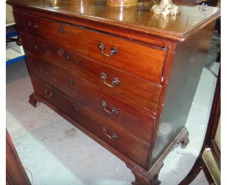 A George III mahogany secretaire chest, the fitted drawer over four long graduated drawers, on ogee bracket feet, 138cm wide.