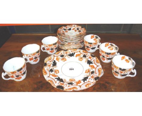 A late 19th century Clifton China porcelain tea service, puce transfer decorated Imari design, comprising; six teacups, six s