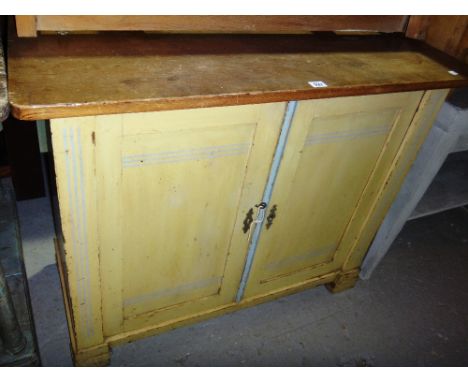 A yellow and blue painted pine two door side cabinet.