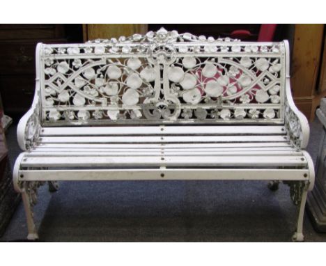 A 20th century white painted garden seat in the style of a Coalbrookdale Nasturtium pattern bench, 128cm wide. 