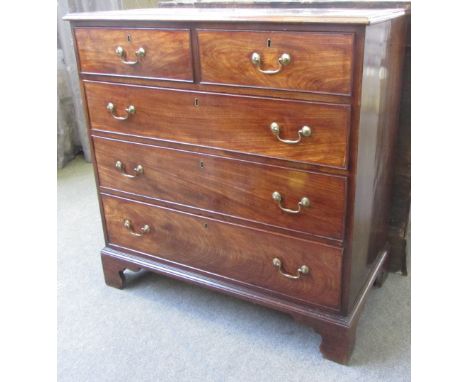 A George III mahogany chest of two short and three long graduated drawers, on bracket feet, 102cm wide.