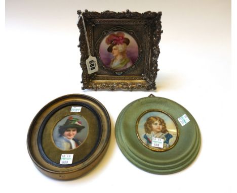 A Continental porcelain miniature circular plaque depicting a Victorian lady in period dress, housed in a silver plated folia