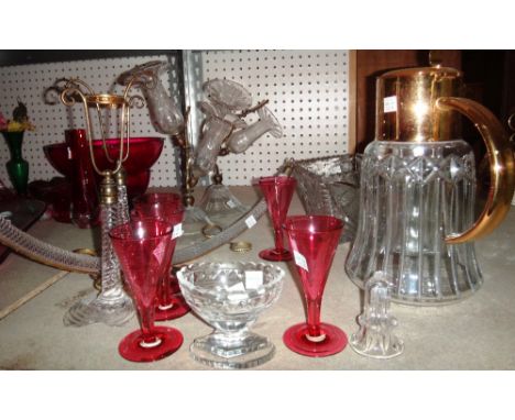 A group of 20th century glassware including a claret jug, table candlesticks, a cut glass bowl, a hanging light and sundry. 