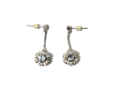 A pair of aquamarine and diamond set pendant cluster earrings, each drop mounted with the circular cut aquamarine at the cent