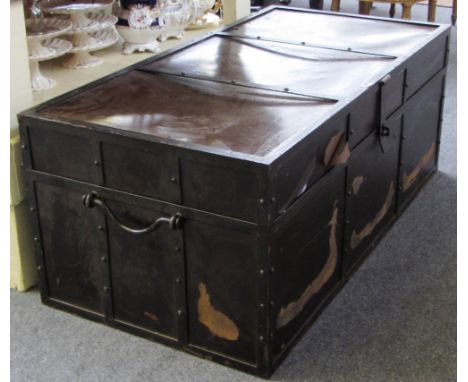 A large early 20th century rectangular metal trunk with side handles, 120cm wide.
