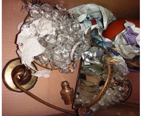 A gilt metal and glass hanging bag chandelier, a similar wall light and a Wedgwood terracotta jug.