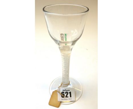 An English wine glass, circa 1760, with ogee bowl and double series opaque twist stem, on a circular foot, 14.5cm high.