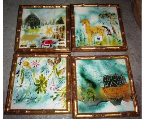 A group of four 20th century enamel decorated wall plaques, plus three pictures.