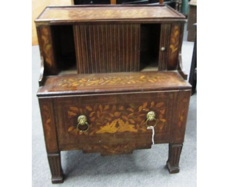 An early 19th century Dutch floral marquetry inlaid walnut step commode with tambour panel over pull out drawer, on channelle