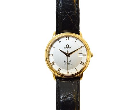 A gentleman's 18ct gold circular cased Omega De Ville wristwatch, the signed circular silvered dial with gilt Roman numerals,