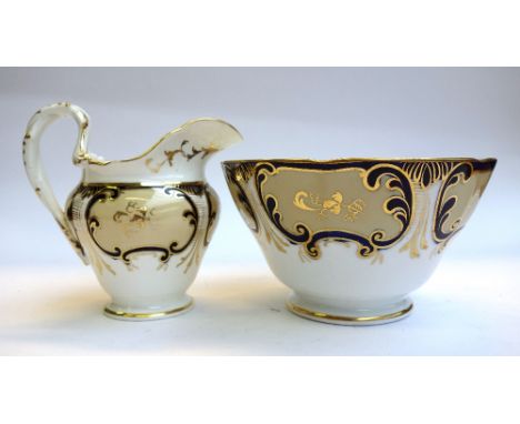 A Ridgway porcelain composite part tea service, mid 19th century, painted in deep cream, blue and gilt, some pieces with flow