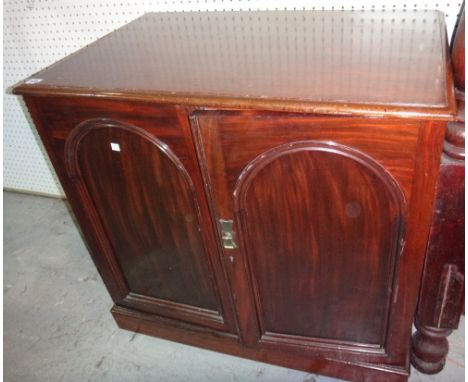 A Victorian mahogany two door side cabinet.