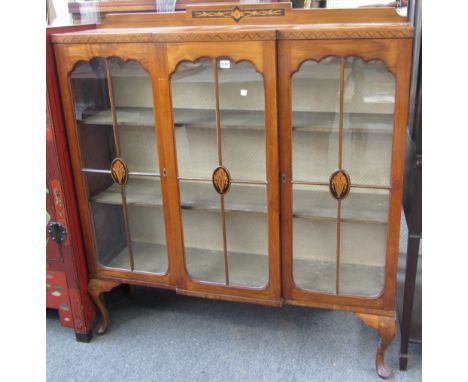 A mid 20th century Tunbridge ware and marquetry inlaid walnut breakfront three door display cabinet, on cabriole supports, 12