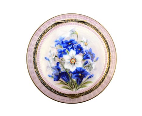 A lady's European silver and enamelled circular powder compact, the hinged cover decorated with gentians and irises otherwise