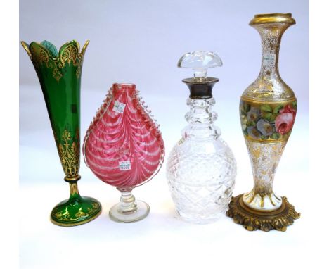 A quantity of coloured glass wares, including; a Bohemian enamel glass vase, late 19th century, decorated with a foliate enam