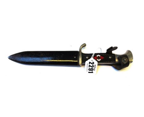 A German WW2 Hitler Youth knife, with a single edged steel blade, 14cm, stamped 117/118, enamel inlaid handle and with metal 
