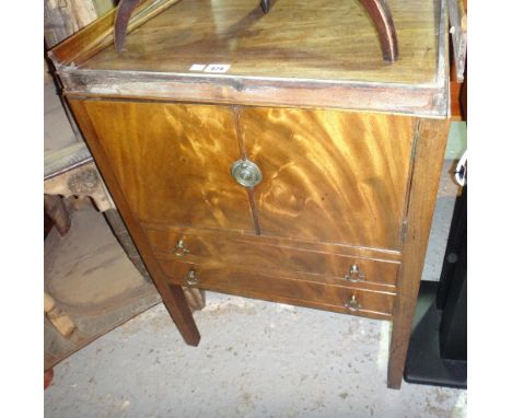 A 20th century mahogany commode.  