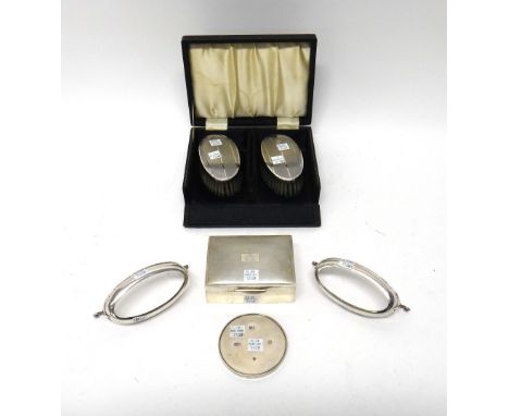 Silver and silver mounted wares, comprising; a pair of oval hairbrushes, with engine turned decoration, Birmingham 1960, a re