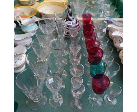 A Nailsea type glass decanter, 20.5cm high, four 19th century wine glasses with knopped stems, two 18th century style opaque 