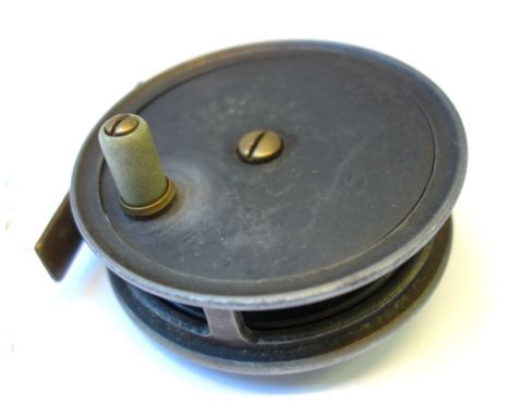 A Hardy type 3.5 inch fishing reel, mid 20th century with composite handle and brass feet. 
