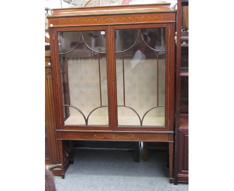 An Edwardian marquetry inlaid display cabinet, the caddy top over pair of glazed doors, on tapering square supports, 109cm wi