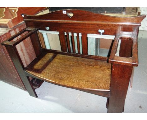 A Glasgow style wall bench in the manner of Wylie and Lochhead.