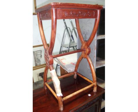 A Chinese X-framed occasional table and a 20th century standard lamp.  