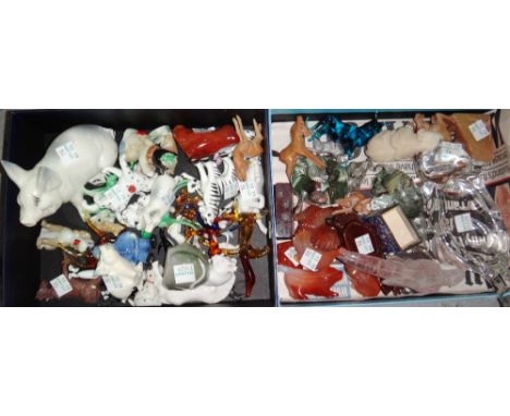 A quantity of miniature models of animals, including ceramic, wooden, hardstone and other examples.