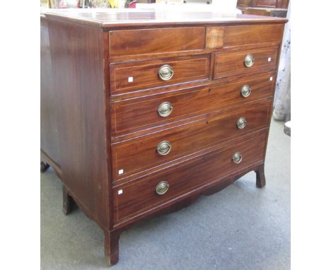 A George III mahogany chest of four short over three long graduated drawers, on splayed bracket feet, 114cm wide.
