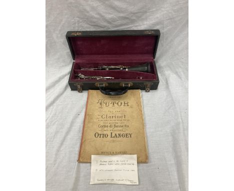 A BOXED BOOSEY AND HAWKES CLARINET 77 BOEHM SYSTEM WITH SPARE REEDS AND 'PRACTICAL TUTOR FOR THE CLARINET' BOOK 